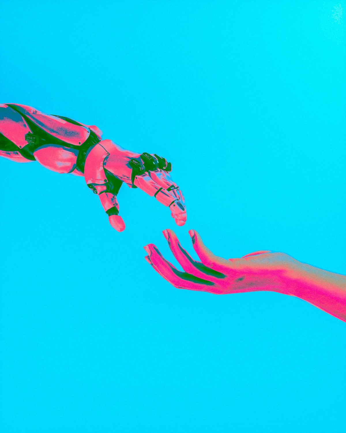 Two outstretched hands almost touching, against a cyan background