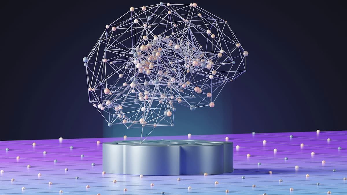 A wireframe brain of connected nodes glowing above a lit podium