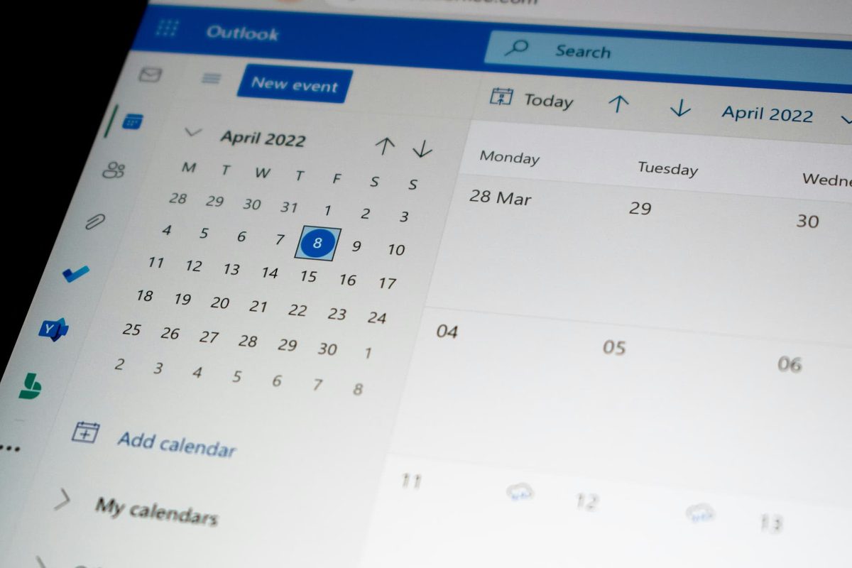 A calendar open on a laptop screen, showing the month of April